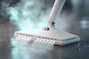 Close-up of MALLIENA steam head releasing steam