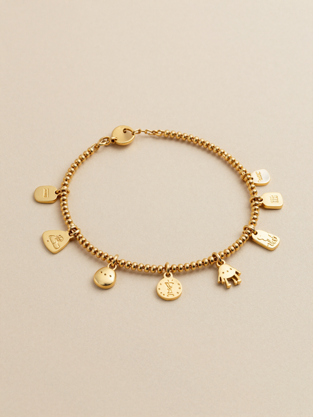 Pulsera de charms dorada