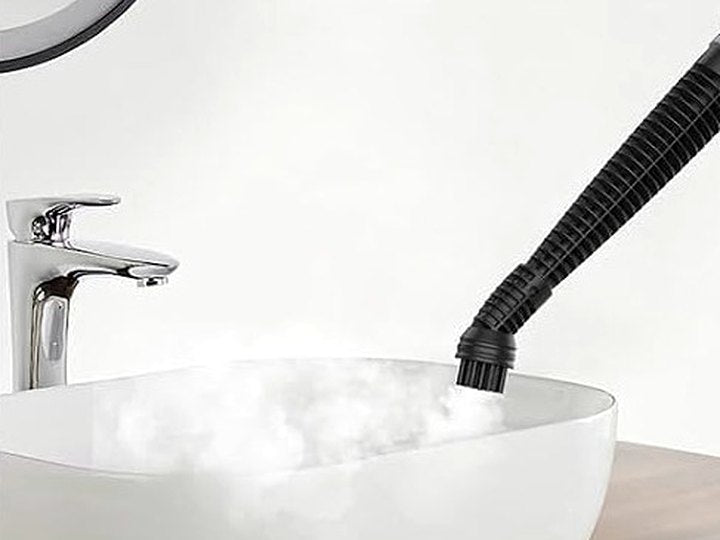 Steam cleaning a bathroom basin and fixtures